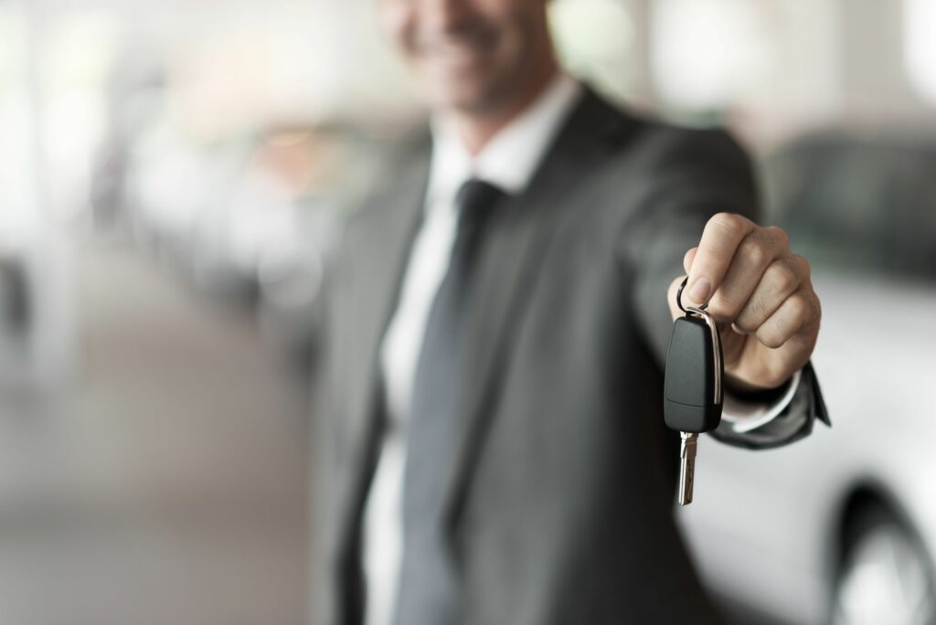 Car Salesman Holding Keys